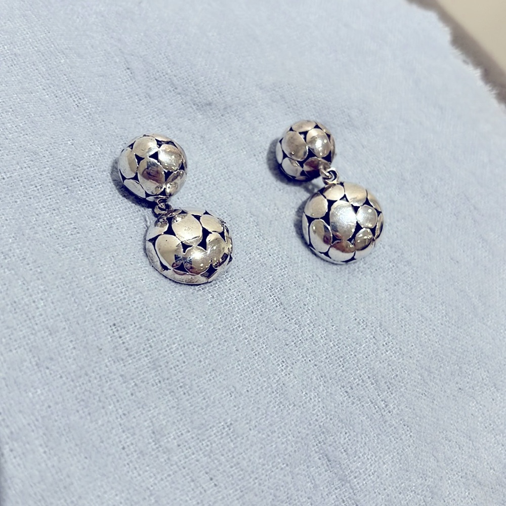 Dangling silver earrings